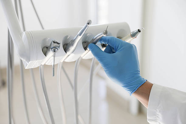 Professional Tooth Extraction technician working in Lemont, IL